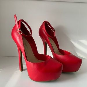 Red platform pumps with ankle strap